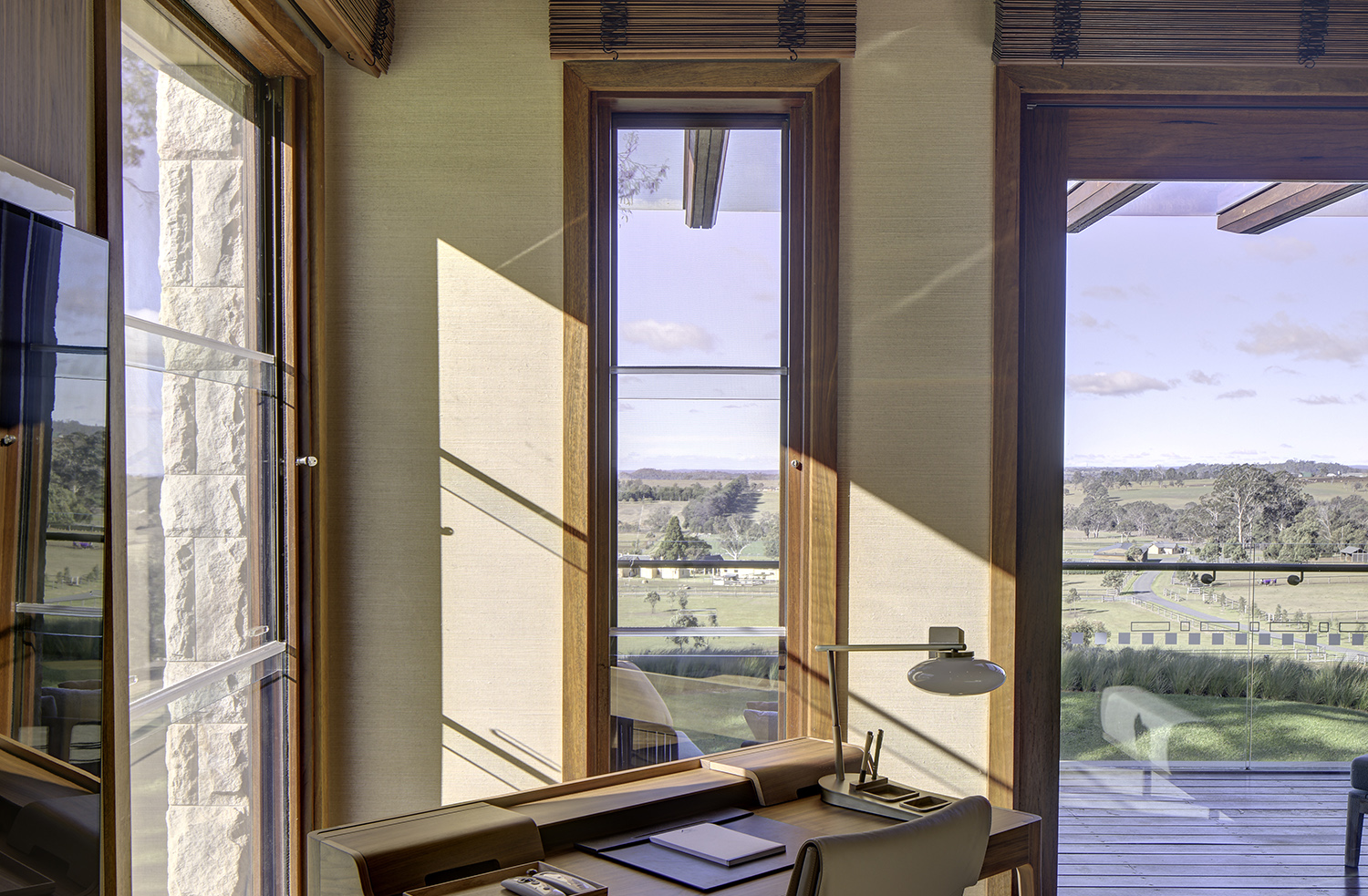 Contemporary timber sashless windows with views to countryside
